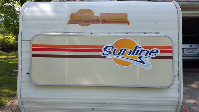 New Logo on camper.jpg