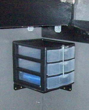 Sterilite drawer set mounted up in corner.png
