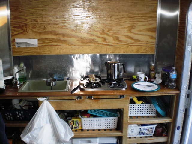 The unfinished Galley at work - coffee and a great burrito on the stove - small.JPG