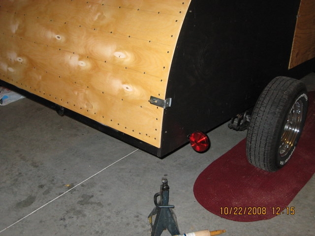 View of temporary tail lights and hatch locks