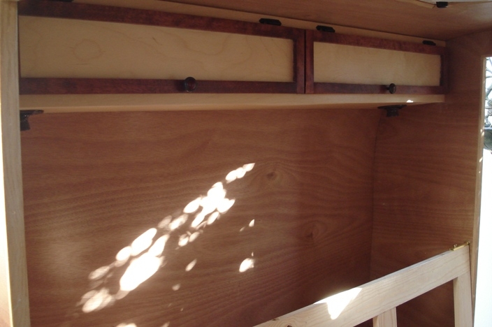 Front cabinets with reading lights and back support for reading