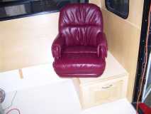 p/s leather swivel in over entry storage compartment.