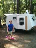 Boy and flamingos camping