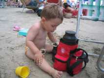 My son Pedro drinking "Chimarrão" at the beach