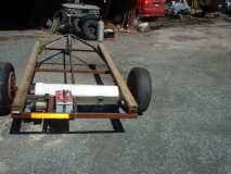 210 trailer frame with 12 gal water tank ,water pump. battery. all will be under the floor