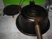 Griswold waffle iron and trivet