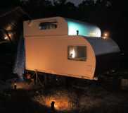 Creative lighting shots of mini travel trailer by cutter