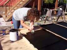 Coating the bottom of the platform with asfault emulsion