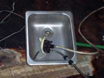 sink with hand pump