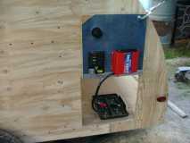 Battery, electrical, storage access panel open