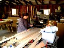 Sanding down the cedar planks