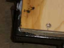 Attached to frame using  wood to metal screws