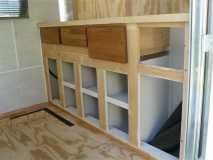 front cabnet shelving in
